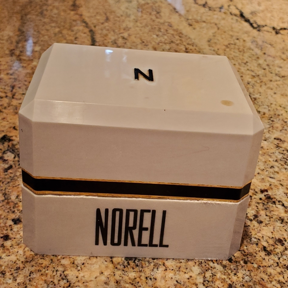 Norman Norell dusting powder